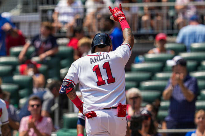 Aug 20, 2023; Cumberland, Georgia, USA; Atlanta Braves shortstop Orlando Arcia (11) reacts after hitting a home run against the San Francisco Giants during the second inning at Truist Park.